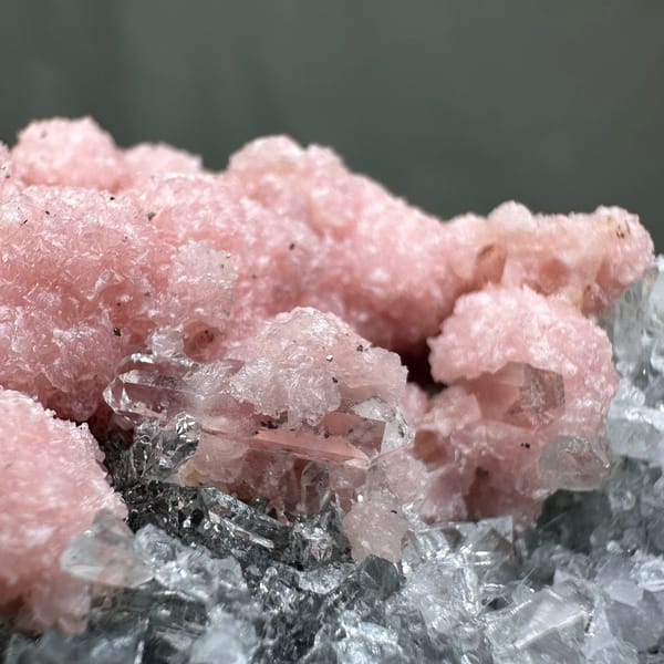 Rose-pink rhodochrosite over grey quartz with pyrite from Guangxi, China, second angle