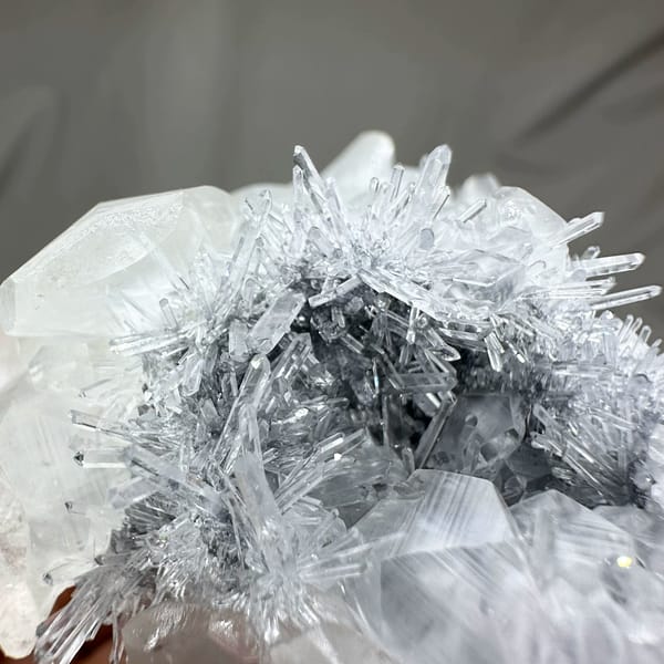 Floater of frosted quartz needles with calcite prisms from Fujian, China, reverse side