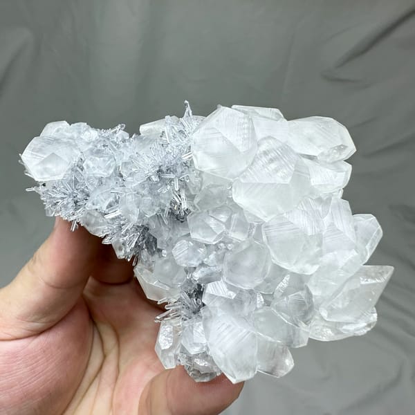 Floater of frosted quartz needles with calcite prisms from Fujian, China, top view