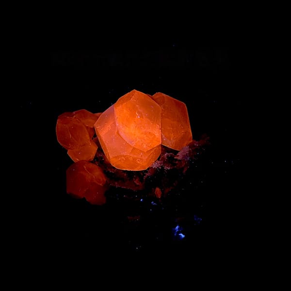 Large yellow-tinted calcite crystal on grey quartz from Fujian, China, second angle