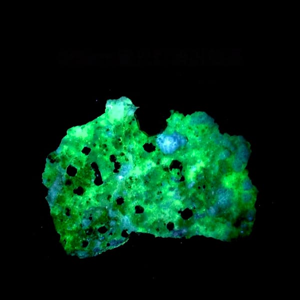 Large dark garnets with hyalite opal on cream feldspar from Yunxiao, Fujian, China, second angle