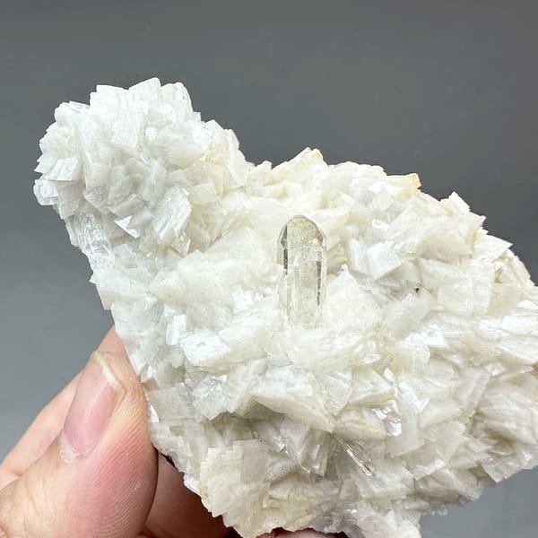 Plate of cream dolomite rhombs with clear quartz from Guizhou, China, second angle
