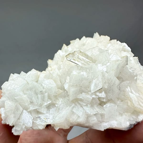 Plate of cream dolomite rhombs with clear quartz from Guizhou, China, reverse side