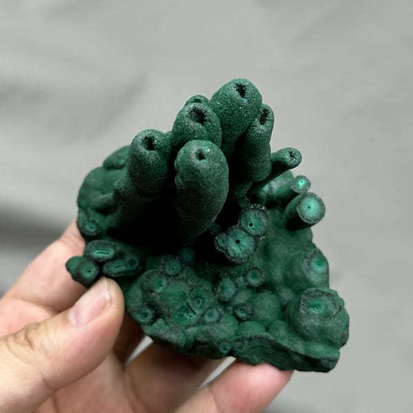 Dark green malachite stalactite pillars from DR Congo, second angle