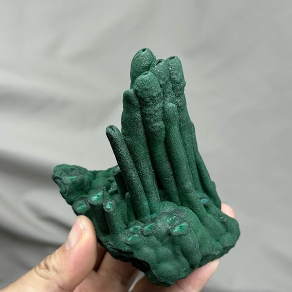 Dark green malachite stalactite pillars from DR Congo, reverse side
