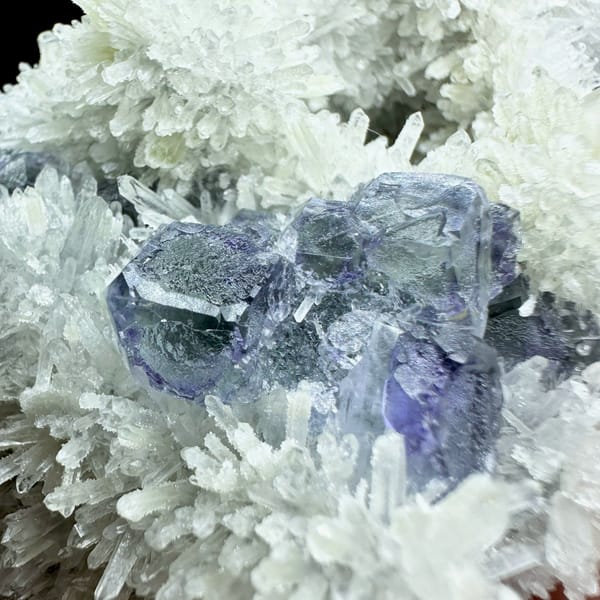 White quartz-needle flowers around blue-green fluorite from Fujian, China, second angle