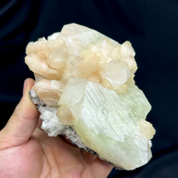 Large pale-green apophyllite crystal with peach stilbite from India, second angle