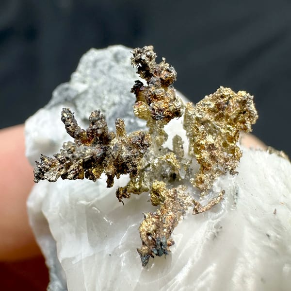 Iridescent dendritic native silver on white calcite from the USA, reverse side
