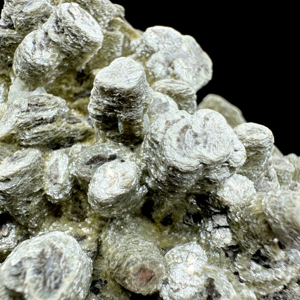 Stacked coin-like mica books covering a rounded mass from Inner Mongolia, China, top view