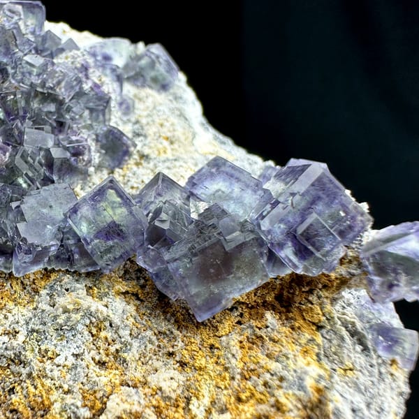 Blue-green phantom fluorite cubes on tan-stained plate from Fujian, China, second angle