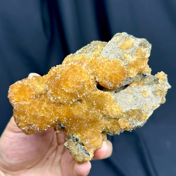 Golden-amber calcite with sparkling crystal skin from Inner Mongolia, China, close-up of the crystal faces