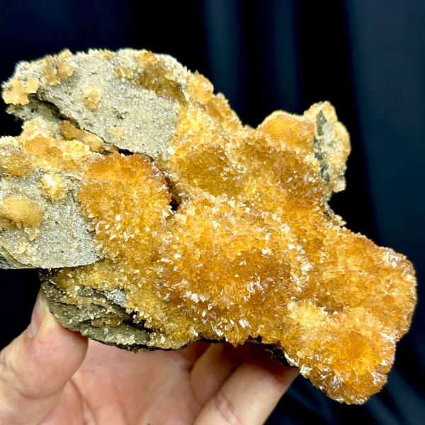 Golden-amber calcite with sparkling crystal skin from Inner Mongolia, China, reverse side