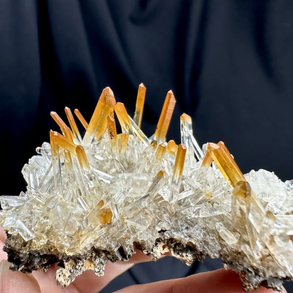 Orange-tipped clear quartz needle fan from Jinkouhe, Sichuan, China, second angle