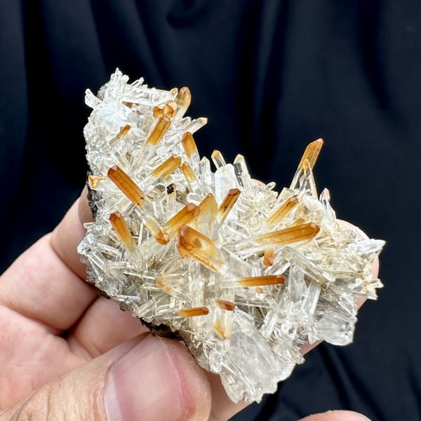 Orange-tipped clear quartz needle fan from Jinkouhe, Sichuan, China, reverse side