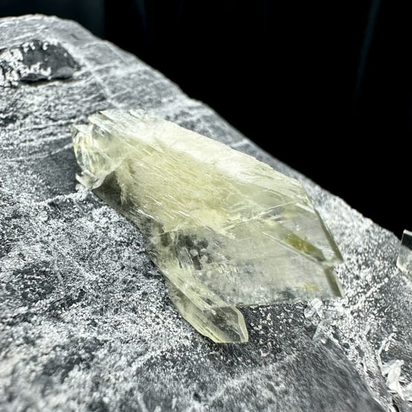 Large transparent double-terminated baryte blade on grey rock from Guangxi, China, reverse side
