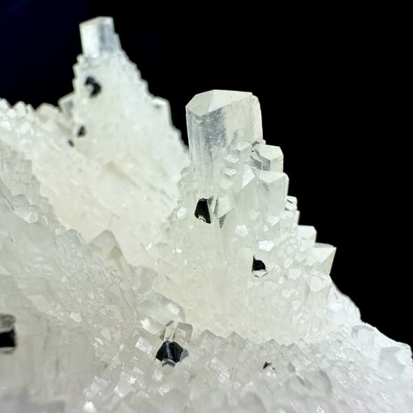 Transparent stepped tower calcite with black marmatite from Hunan, China, reverse side