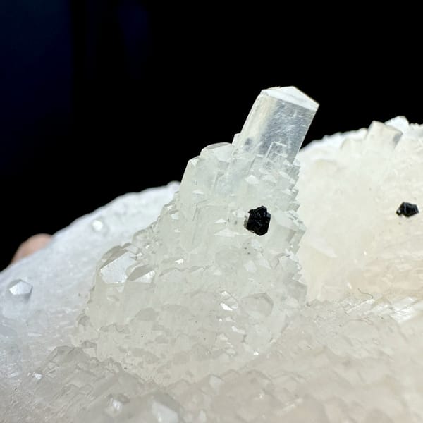 Transparent stepped tower calcite with black marmatite from Hunan, China, top view