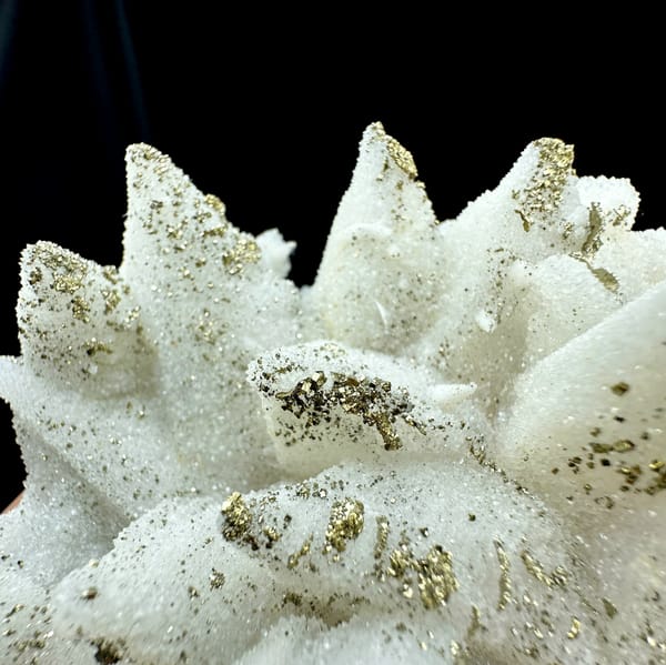 Pale quartz pseudomorphs after calcite with pyrite from Fujian, China, top view