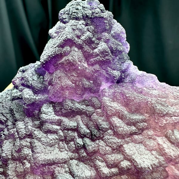 Magenta-purple stepped fluorite plate from Guizhou, China, reverse side