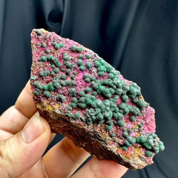 Green malachite balls over hot-pink cobaltoan calcite from DR Congo, reverse side