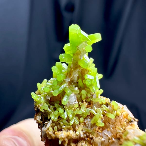 Bright lime-green pyromorphite tufts on tan matrix from Guangxi, China, second angle