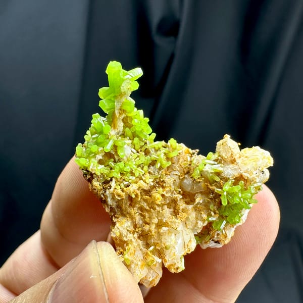 Bright lime-green pyromorphite tufts on tan matrix from Guangxi, China, top view