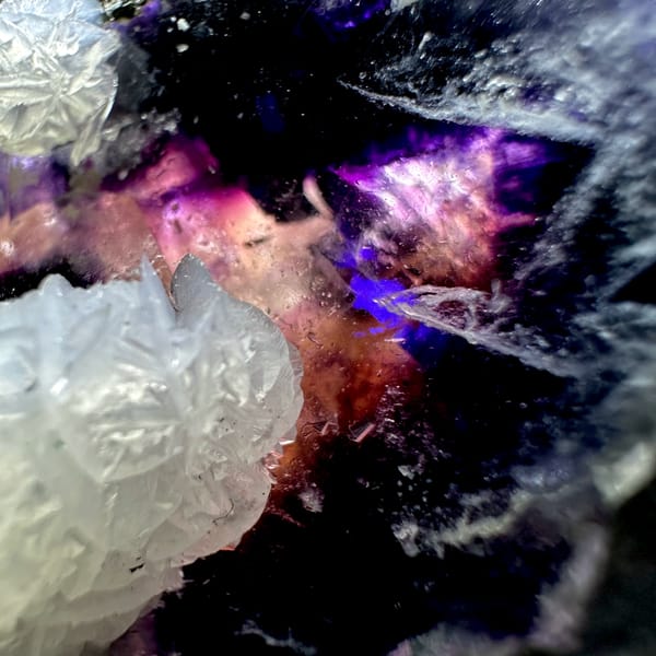 Dark phantom fluorite cube in white calcite with pyrrhotite from Inner Mongolia, China, second angle