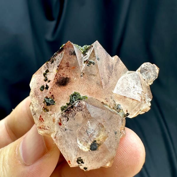 Orange-red garden quartz floater with green epidote from Sichuan, China, second angle