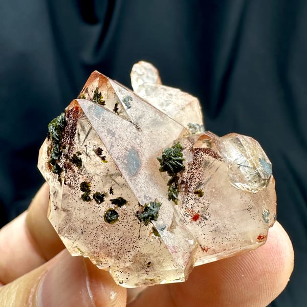 Orange-red garden quartz floater with green epidote from Sichuan, China, reverse side