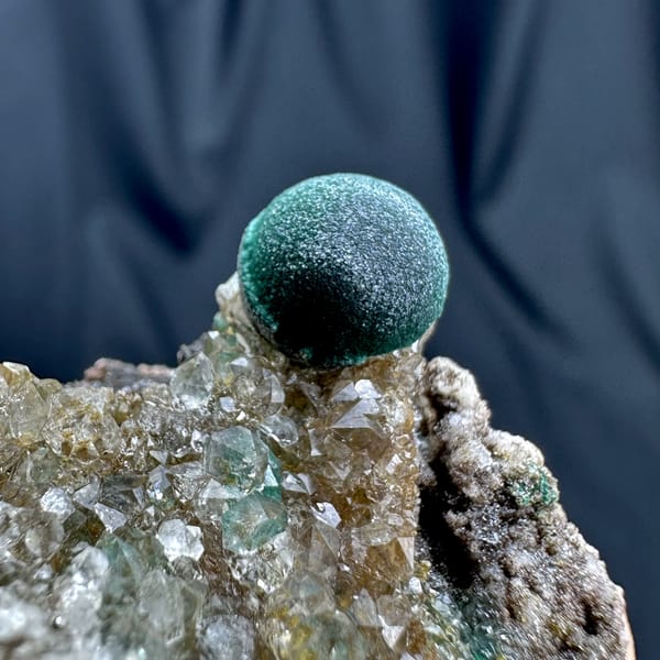 Single velvet-green malachite ball on sugary quartz from DR Congo, second angle