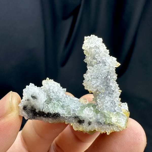 Pale green fluorite plate with quartz-druse stalk from Fujian, China, reverse side