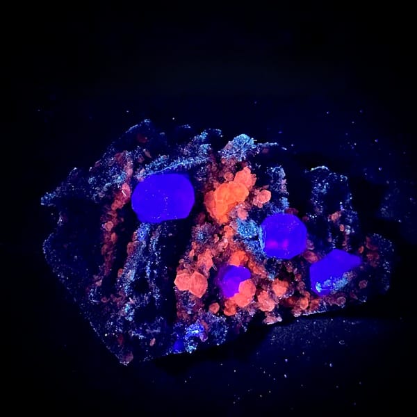 Blue-windowed green fluorite cubes on dark quartz druse from Fujian, China, second angle