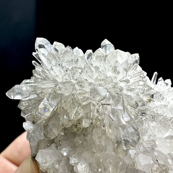 Chrysanthemum-quartz cluster of radiating clear needles from Fujian, China, top view