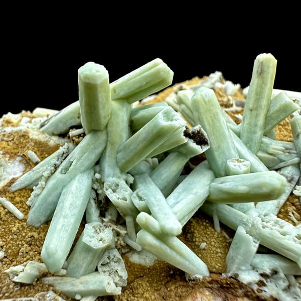 Pale green plumbogummite prisms on ochre matrix from Guangxi, China, second angle