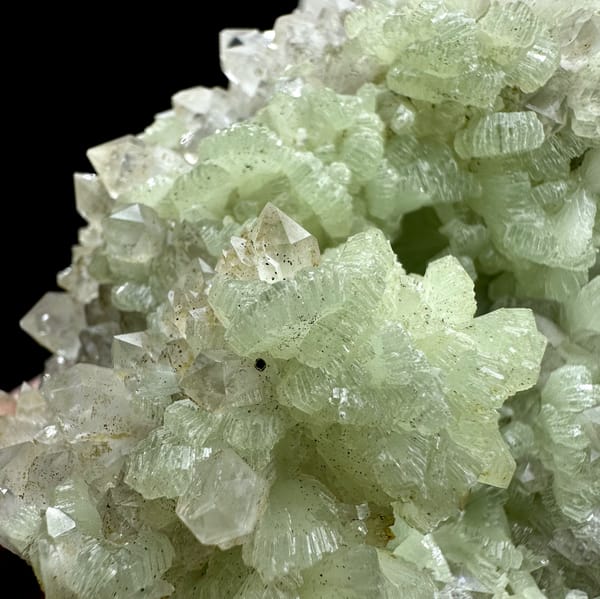 Mound of pale green fan-shaped prehnite from Morocco, top view