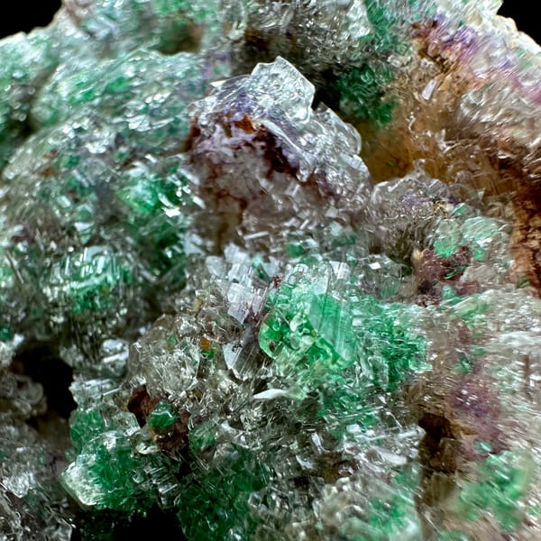 Green malachite over purple-edged fluorite in gypsum from Guizhou, China, second angle