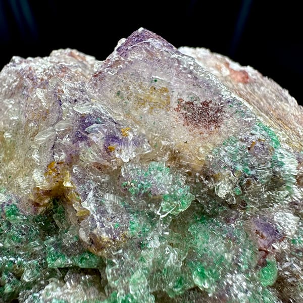 Green malachite over purple-edged fluorite in gypsum from Guizhou, China, top view
