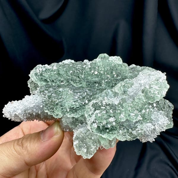 Sugar-green fluorite matrix with quartz from Guangdong, China, close-up of the crystal faces