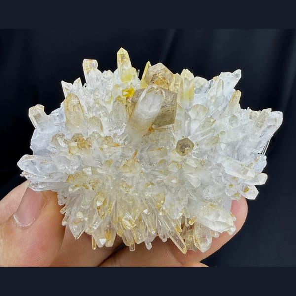 Hexagonal platy calcite on golden quartz cluster — complete view