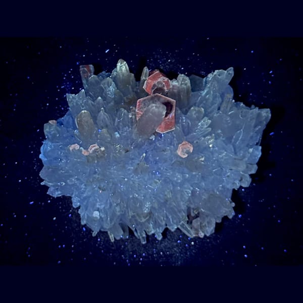 Hexagonal platy calcite on golden quartz cluster — detail view