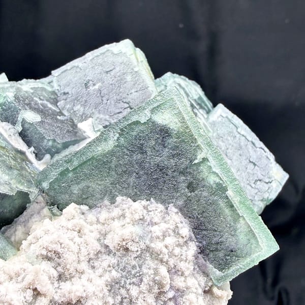 Large slate-green frosted fluorite cubes with white druse from Inner Mongolia, China, reverse side