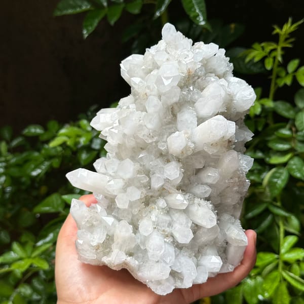 Large white quartz cluster with platy hexagonal calcite from Fujian, China, close-up of the crystal faces