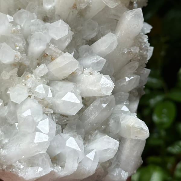 Large white quartz cluster with platy hexagonal calcite from Fujian, China, base view