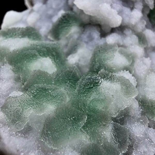 Lavender-grey stepped octahedral fluorite with green corners from Fujian, China, reverse side