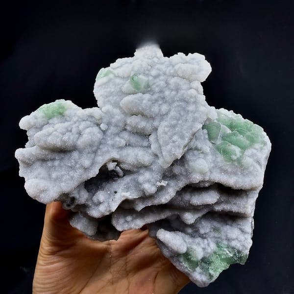 Lavender-grey stepped octahedral fluorite with green corners from Fujian, China, top view
