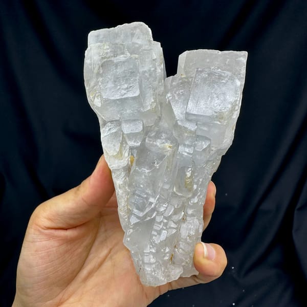 Large white baryte floater of stacked tabular blades from Jinkouhe, Sichuan, China, close-up of the crystal faces