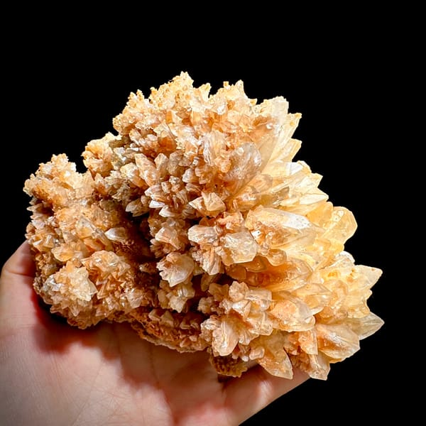 Large peach calcite cluster with sparkling crystal skins from Yunnan, China, reverse side