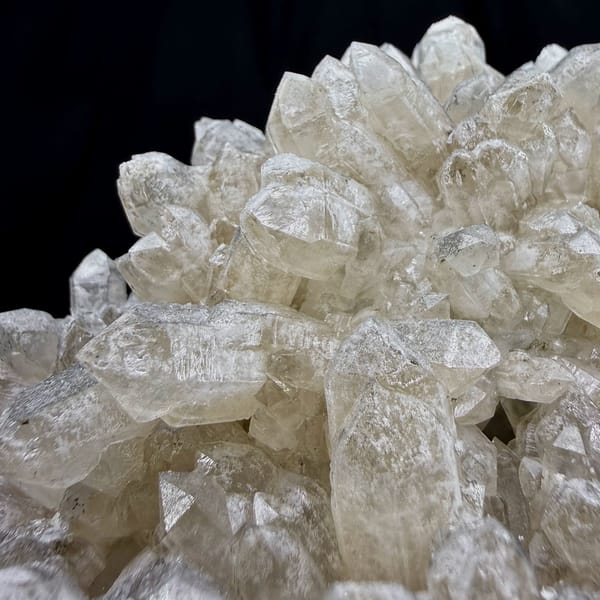 Heart-shaped cluster of pale quartz points from Inner Mongolia, China, close-up of the crystal faces