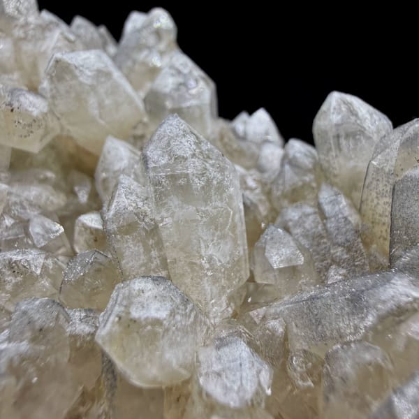 Heart-shaped cluster of pale quartz points from Inner Mongolia, China, reverse side