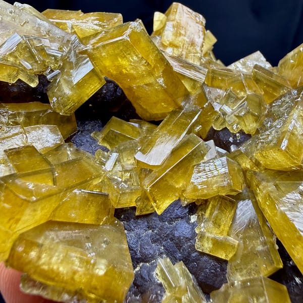Block of golden baryte blades with purple fluorite from Jiangxi, China, reverse side